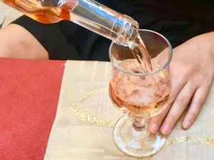 cotes du provence rose being poured into glass