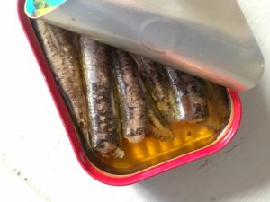 open tin of anchovies