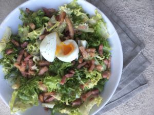 Salade Lyonnaise on a linen napkin