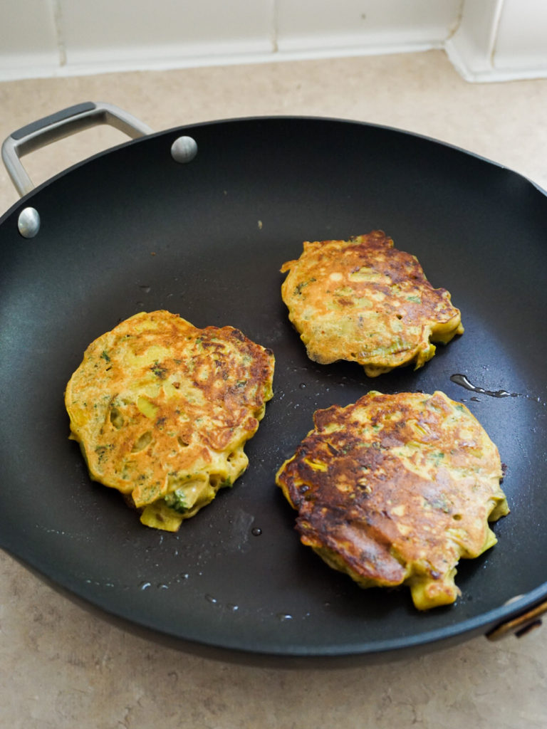 Leek fritters with herbed yogurt dollop from Ottolenghi's Plenty in frying pan