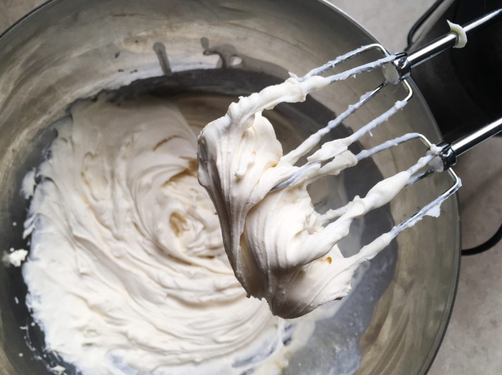 Mascarpone and whipping cream filling with hand mixer beaters