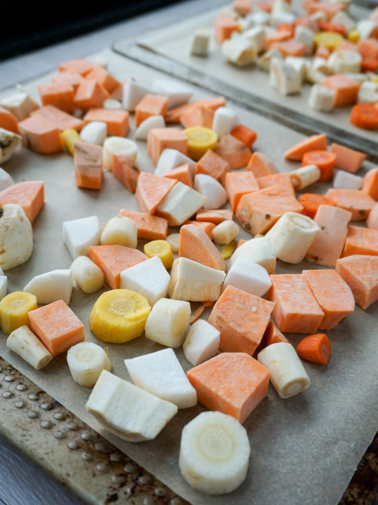 Root vegetables on baking pan