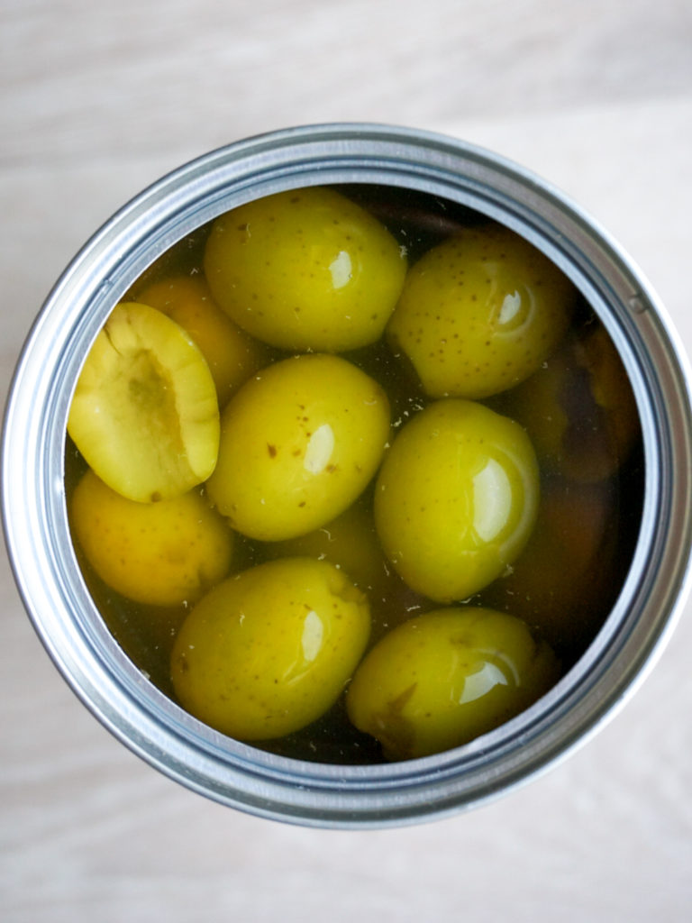 Olives in jar for artichoke tapenade with rosemary oil from David Lebovitz's My Paris Kitchen