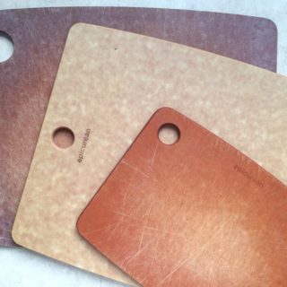 Three wood composite epicurean cutting boards in various shades of brown