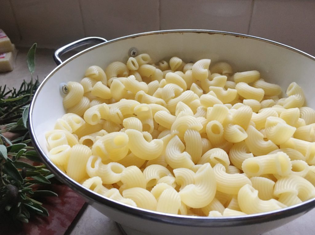Drained macaroni in colander