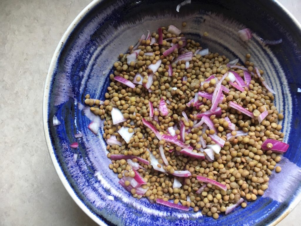 lentils du puy and onions in blue bowl from provence