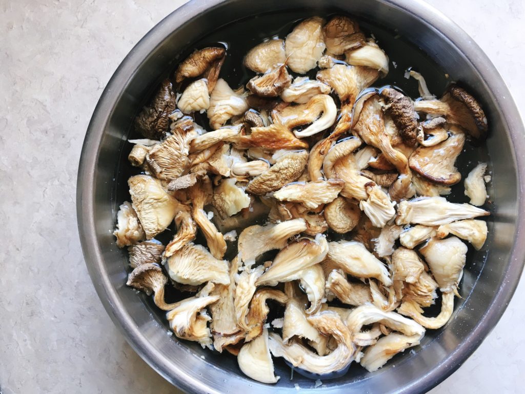 Dried mushrooms soaking in water