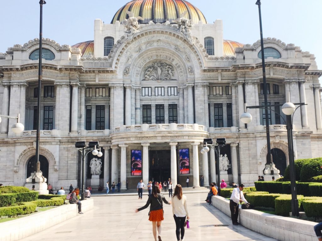 Alex and Kimbo in front of Palacio de Bellas Artes, Mexico City