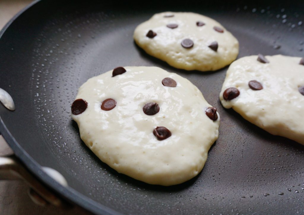 Bette's buttermilk pancakes with chocolate chips, on the griddle