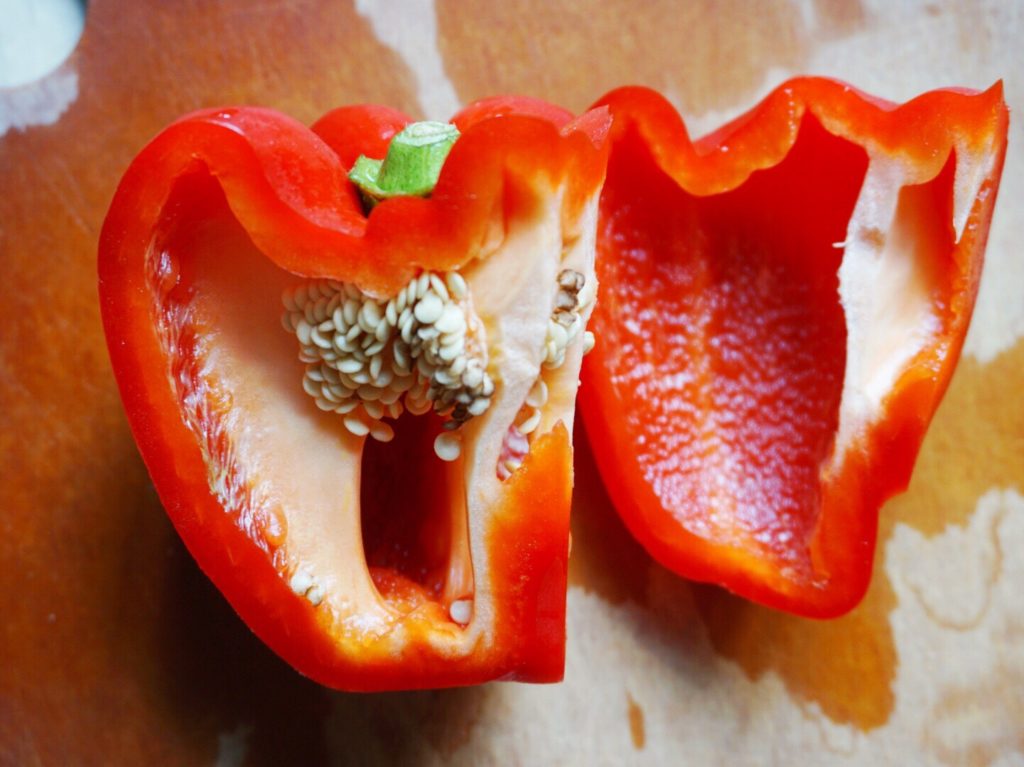 Red bell pepper with two cuts through it