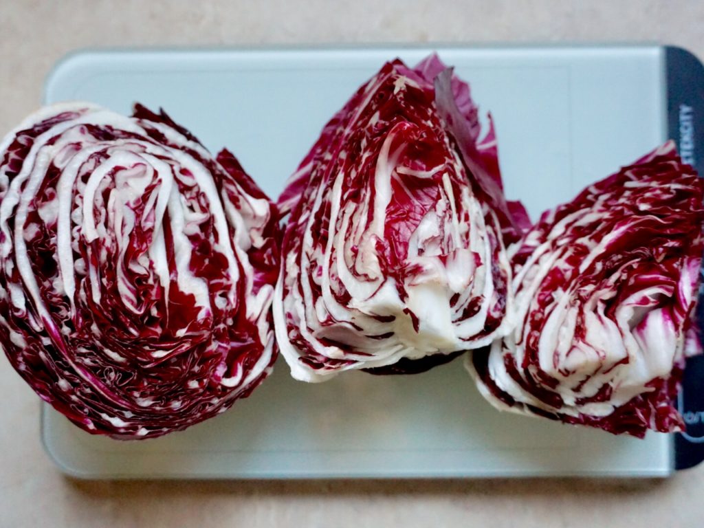 Weighing radicchio for farro risotto
