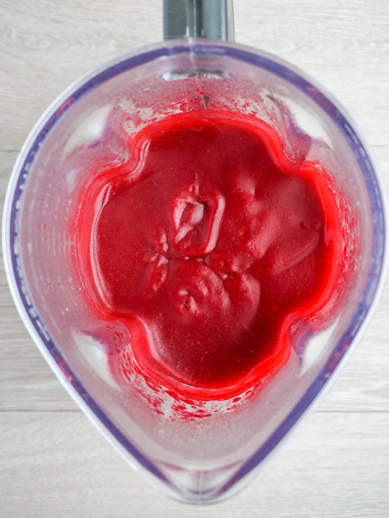 Cranberry puree in blender for Cranberry Lime Curd Pie from Bon Appetit