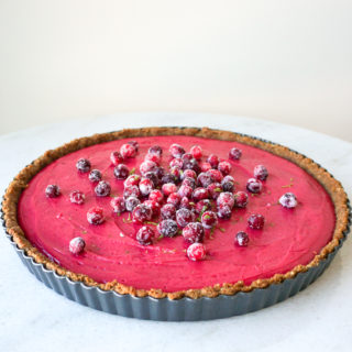 Cranberry-Lime Curd Tart from Bon Appetit on marble table