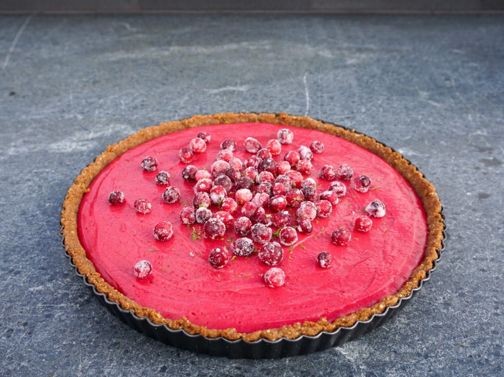 Cranberry Lime Curd Pie from Bon Appetit on dark grey countertop