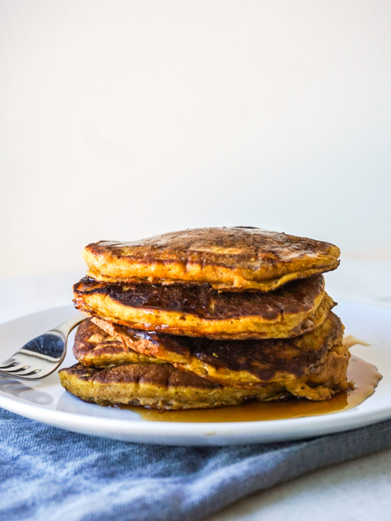 Pumpkin pancake recipe from scratch on white plate from Bon Appetit 