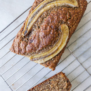 Sliced banana bread on cooling rack for easy healthy banana bread recipe