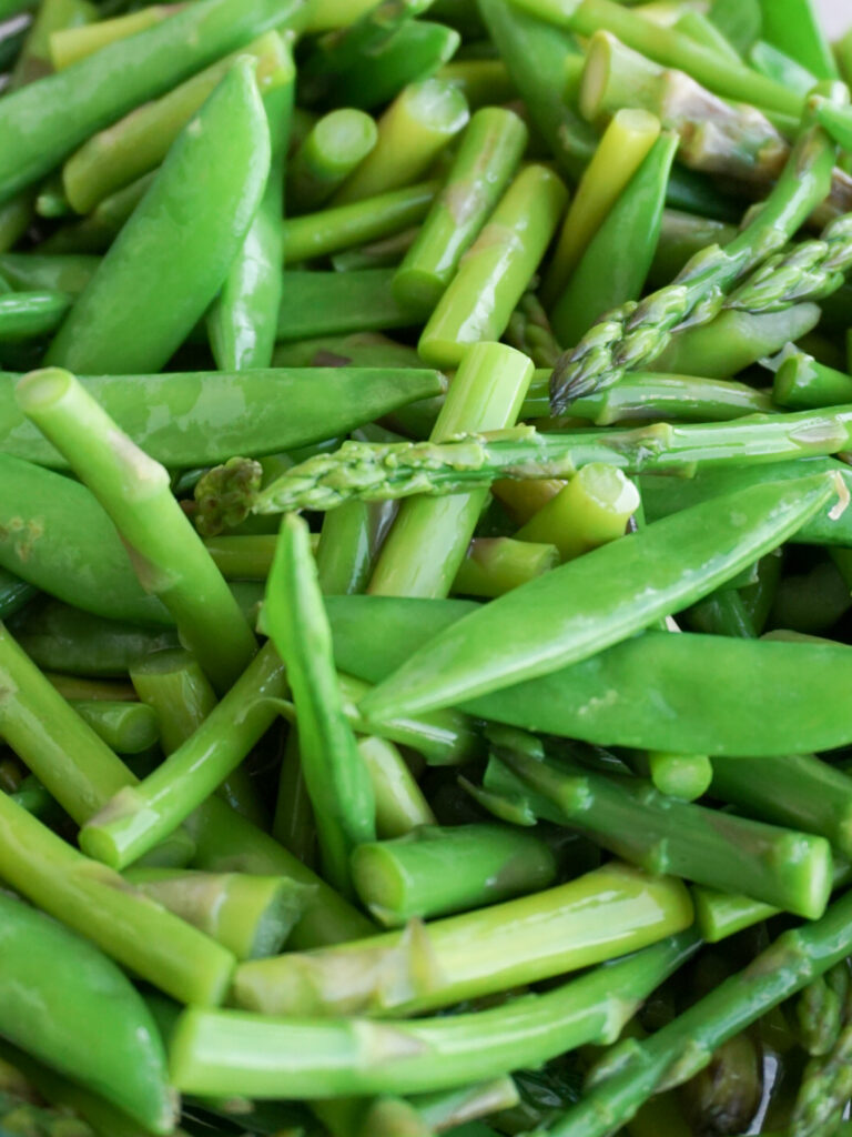 Aspragus and sugar snap pea close up for spring panzanella salad