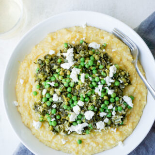 Easy polenta recipe with spinach, peas, and goat cheese