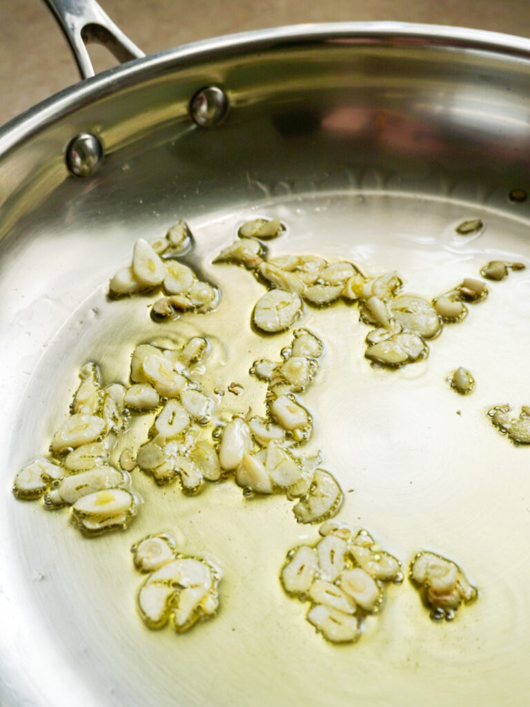 Garlic frying in olive oil